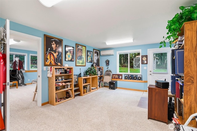 carpeted home office featuring plenty of natural light and a wall unit AC