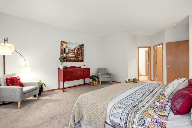 bedroom featuring light colored carpet