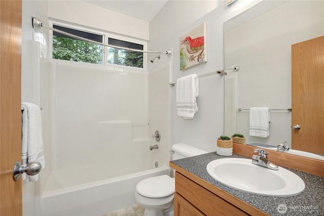 full bathroom featuring shower / bathtub combination, vanity, and toilet