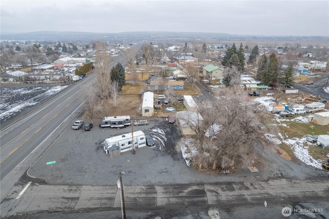 birds eye view of property with a residential view