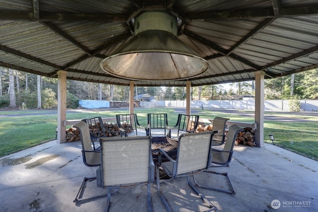 view of patio with a gazebo and outdoor dining space