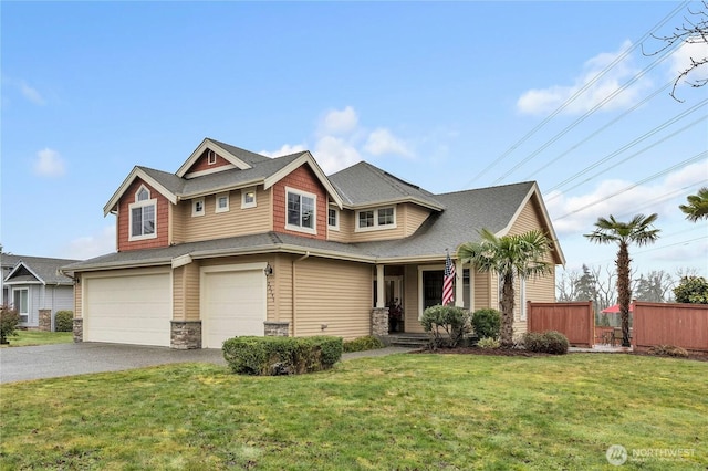 craftsman-style home featuring a garage and a front yard