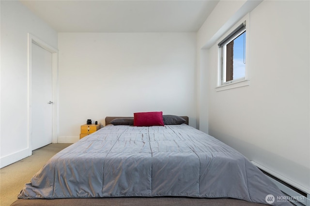 bedroom with light carpet