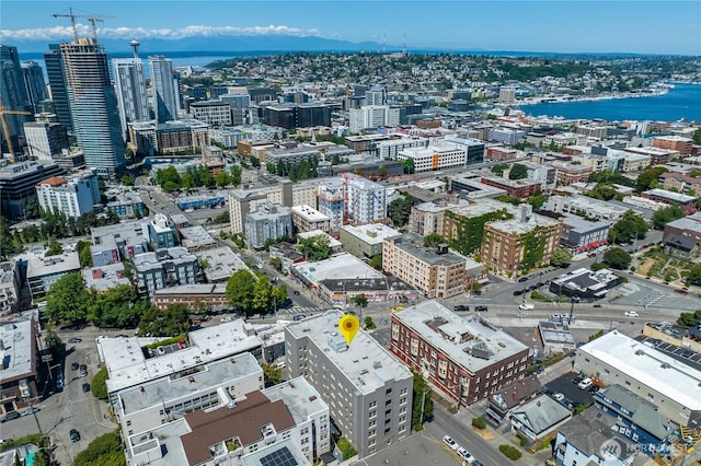 aerial view featuring a water view and a city view