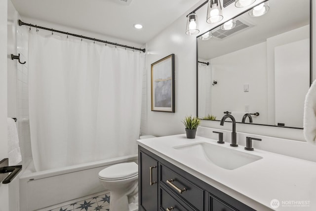 full bathroom with shower / tub combo, toilet, and vanity