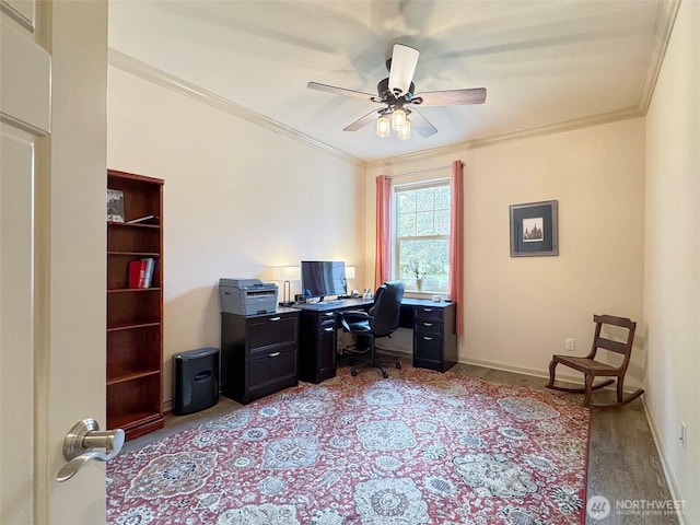 home office with baseboards, a ceiling fan, light wood-style floors, and ornamental molding