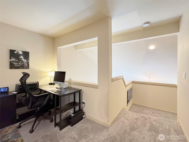 office area with baseboards and carpet floors