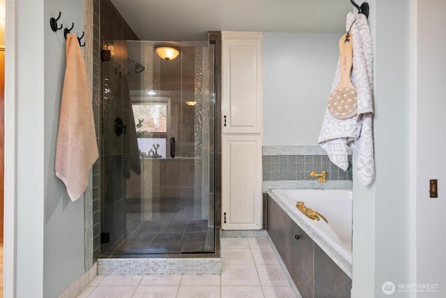 4801 Hyada Blvd NE, Tacoma, WA 98422 - bathroom with tile patterned floors, a bath, and a stall shower
