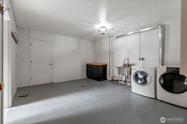 4801 Hyada Blvd NE, Tacoma, WA 98422 - laundry room featuring laundry area, a sink, and washer and clothes dryer
