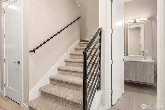 stairs with tile patterned flooring