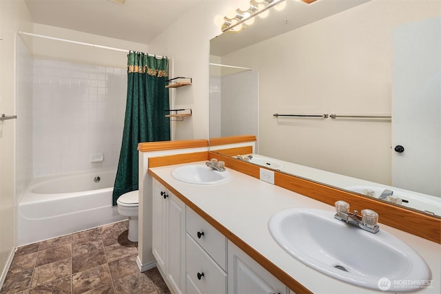 full bathroom with a sink, toilet, and shower / bath combo with shower curtain