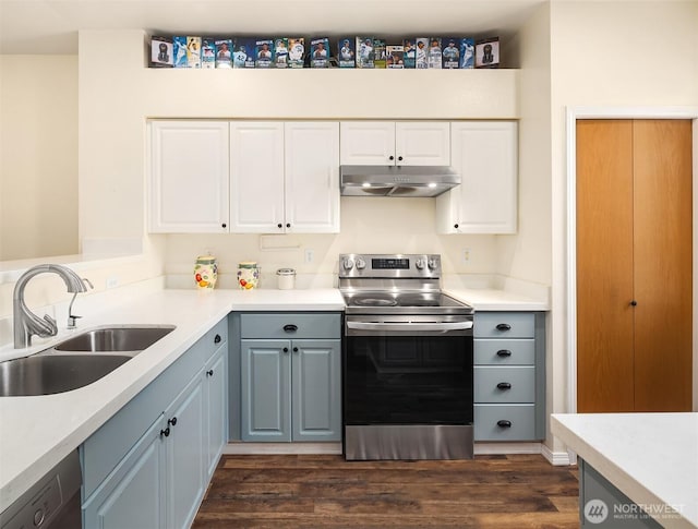 kitchen featuring dark wood finished floors, electric stove, dishwasher, under cabinet range hood, and a sink