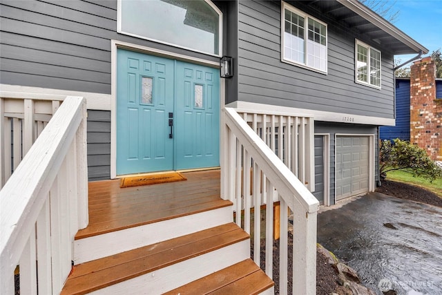 property entrance featuring a garage