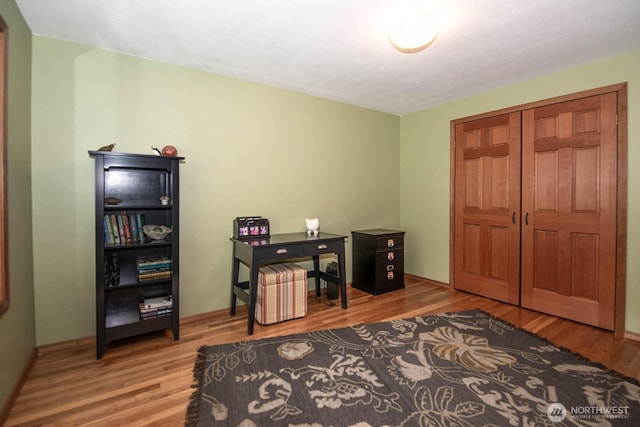 office space with wood finished floors