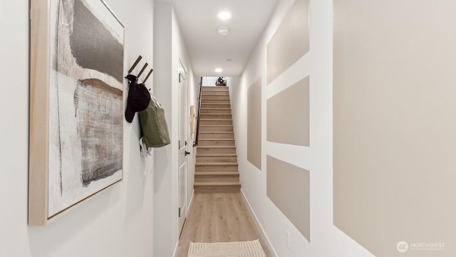 hall with light hardwood / wood-style floors