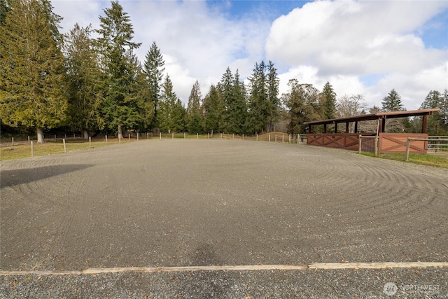 view of road featuring an enclosed area