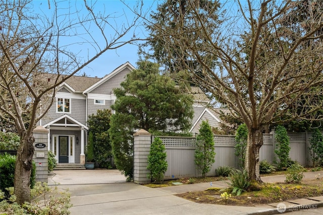 view of front of home with fence