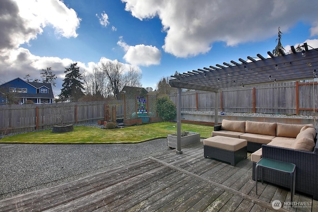 wooden deck featuring a fenced backyard, an outdoor living space, a pergola, and a yard