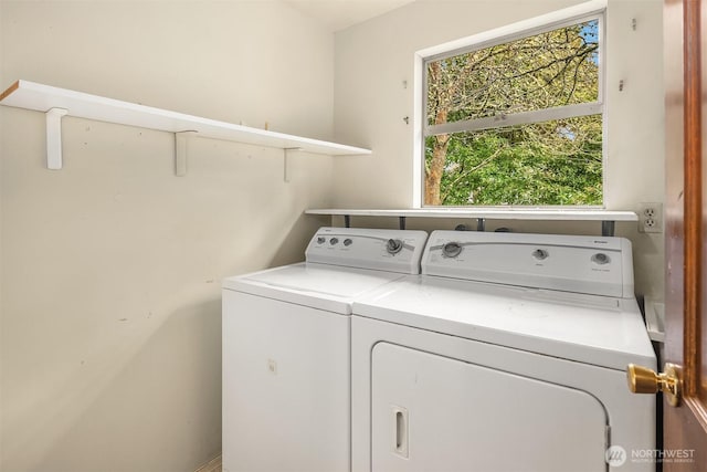 laundry room featuring laundry area and washer and clothes dryer