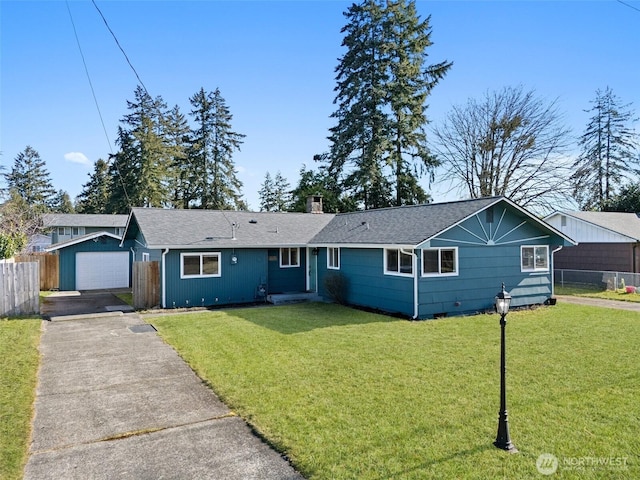 single story home featuring a front lawn and a garage