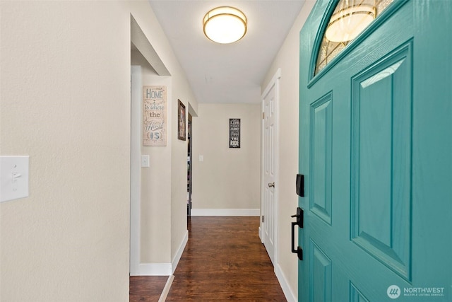 hall with dark wood-type flooring