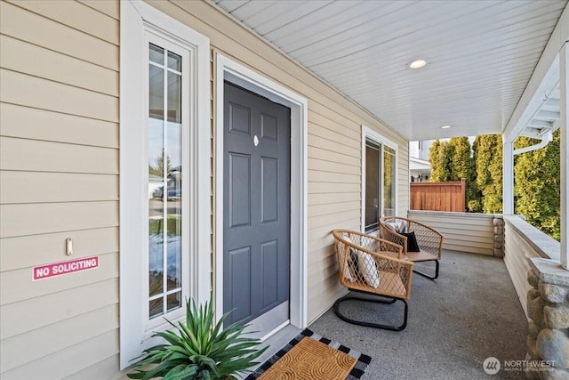 doorway to property featuring a porch