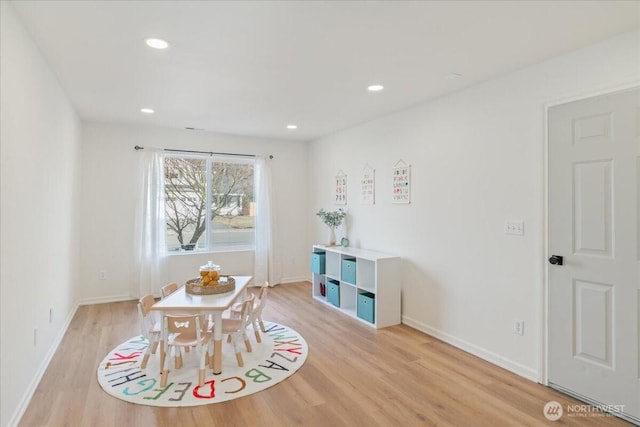 rec room with light wood-type flooring