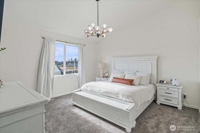 bedroom featuring dark colored carpet and a notable chandelier