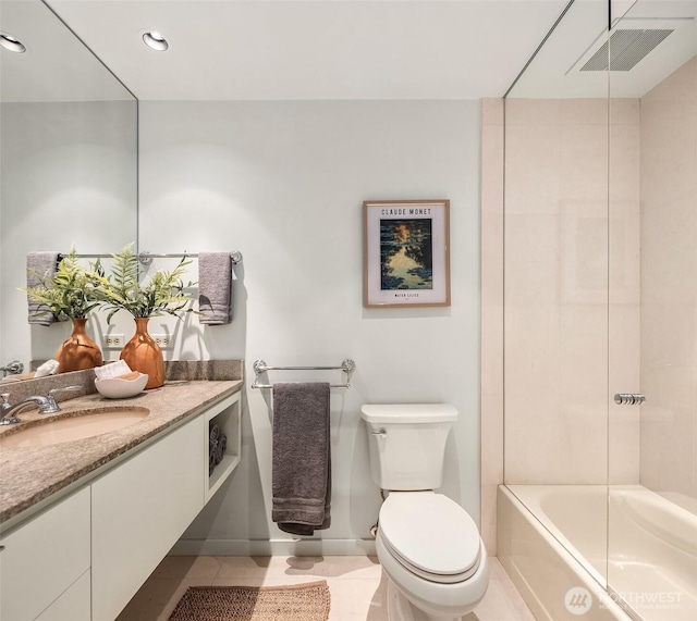 bathroom featuring toilet, tile patterned floors, vanity, shower / washtub combination, and recessed lighting