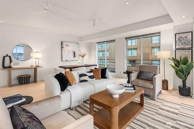 carpeted living room featuring recessed lighting