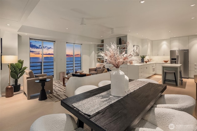 dining room with recessed lighting