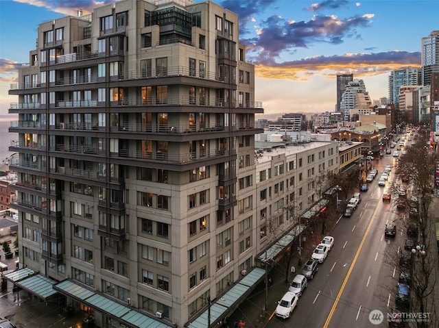 view of building exterior featuring a city view