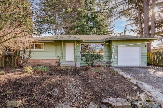 single story home with a garage