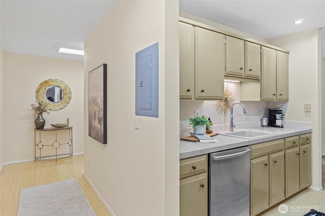 kitchen featuring electric panel, sink, cream cabinetry, and stainless steel dishwasher