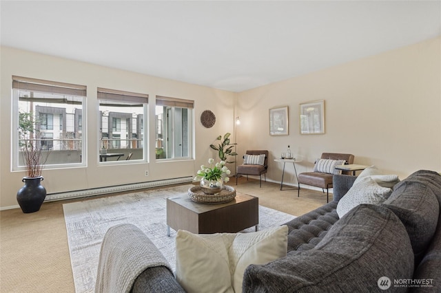 living room with a baseboard radiator and light colored carpet