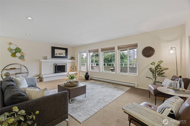 carpeted living room featuring a baseboard heating unit