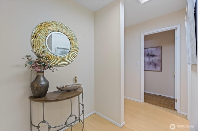 hallway featuring light hardwood / wood-style flooring