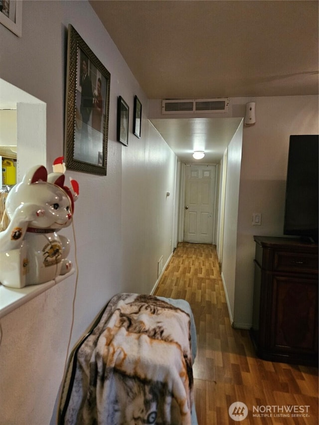 hall featuring hardwood / wood-style flooring