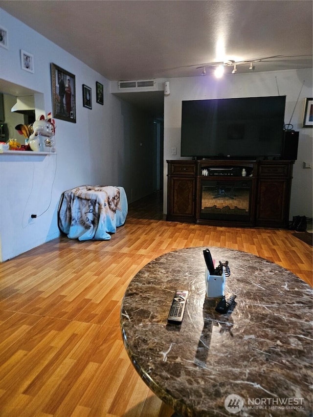 living room featuring hardwood / wood-style flooring