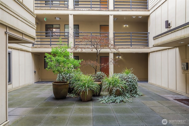 view of patio with a balcony