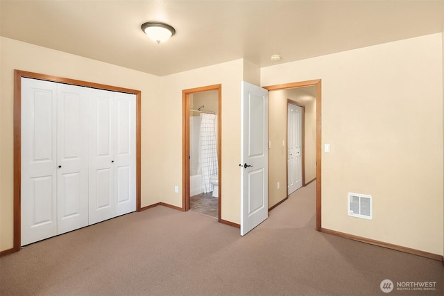 211 Broadway St, Cle Elum, WA 98922 - unfurnished bedroom with carpet, a closet, and ensuite bathroom
