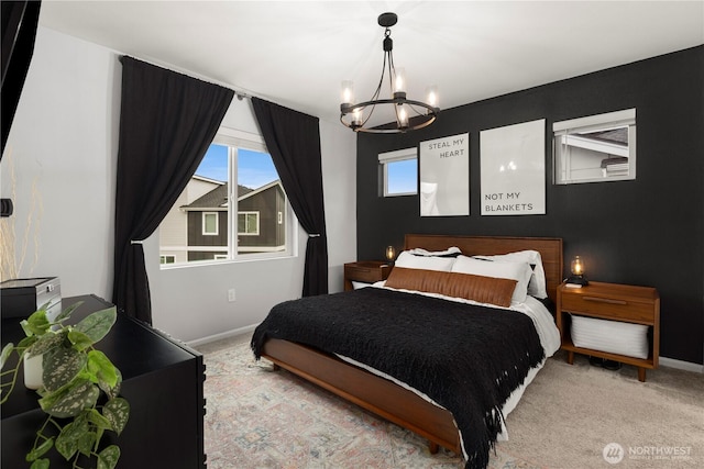 bedroom featuring light carpet, baseboards, and multiple windows