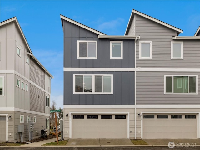 view of front of house with an attached garage and board and batten siding