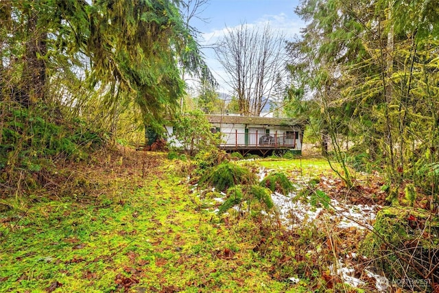 exterior space featuring a wooden deck