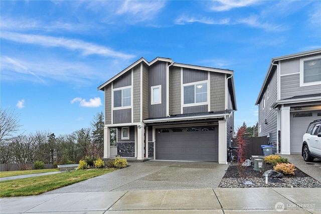 front of property with a garage