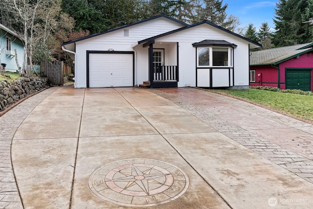 ranch-style home with a garage