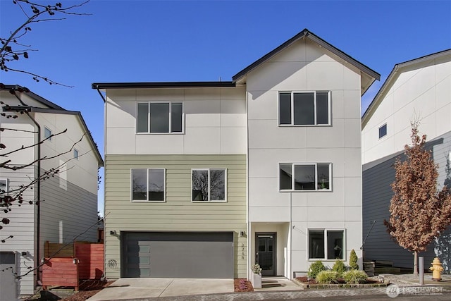 contemporary house featuring driveway and an attached garage