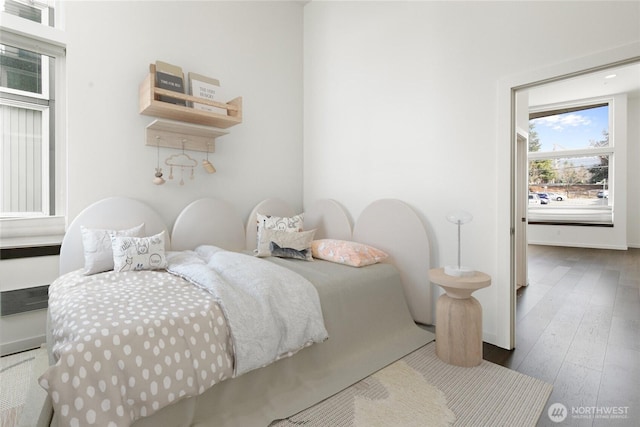 bedroom with wood-type flooring