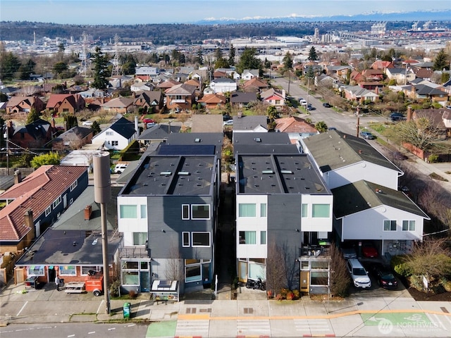 birds eye view of property with a residential view