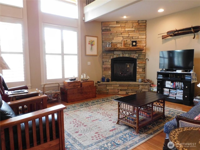 2611 Sea Crest Ave N, Long Beach, WA 98631 - living area featuring wood finished floors and a stone fireplace